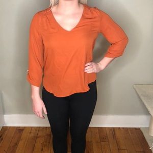 Burnt orange blouse
